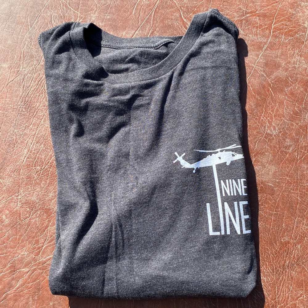 *Never worn!* Men’s Nine Line graphic tee